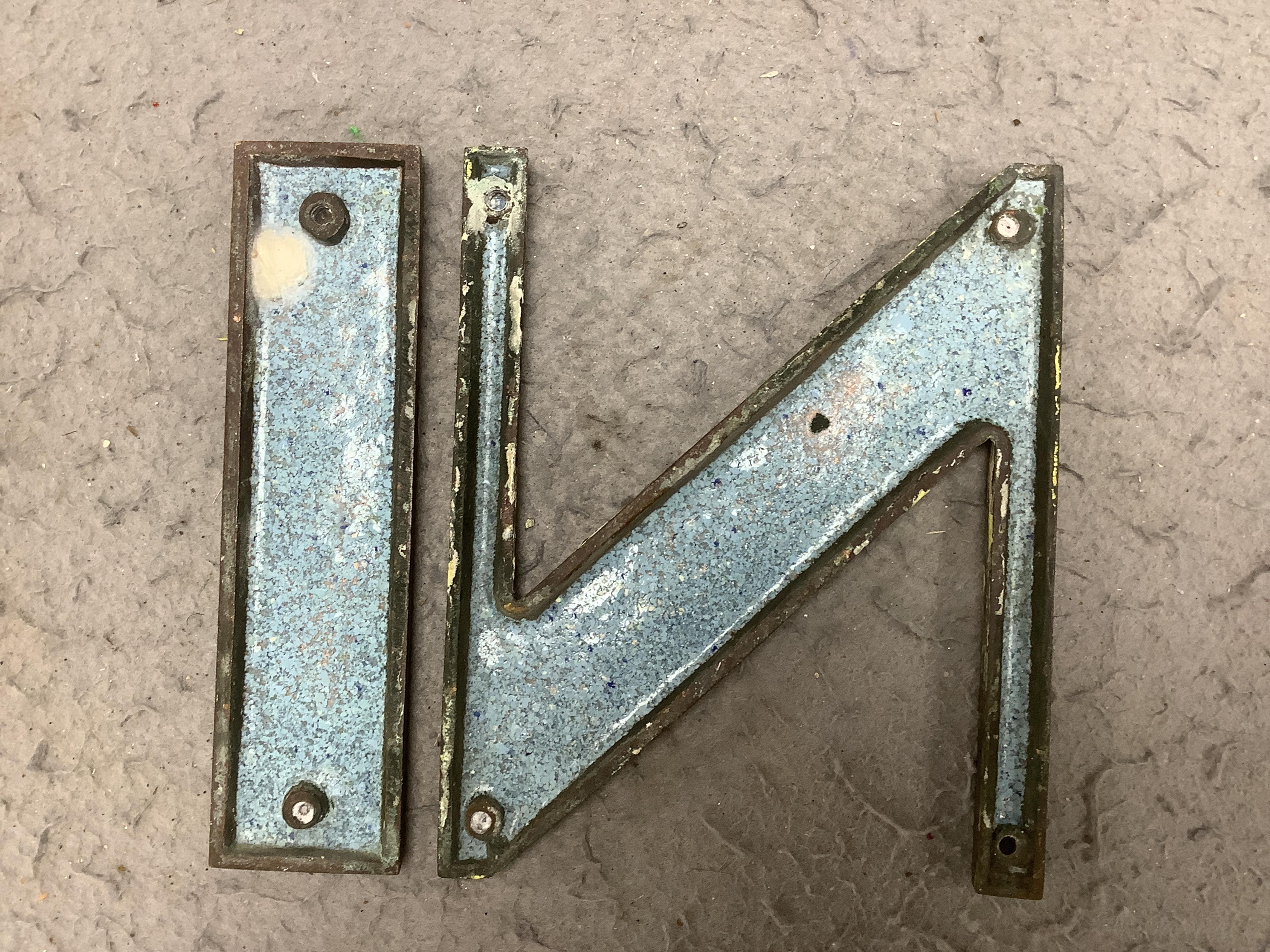 Art Deco green enamelled cast metal letters to spell ‘IN’ and ‘OUT’, 15cm tall. Condition - fair to good